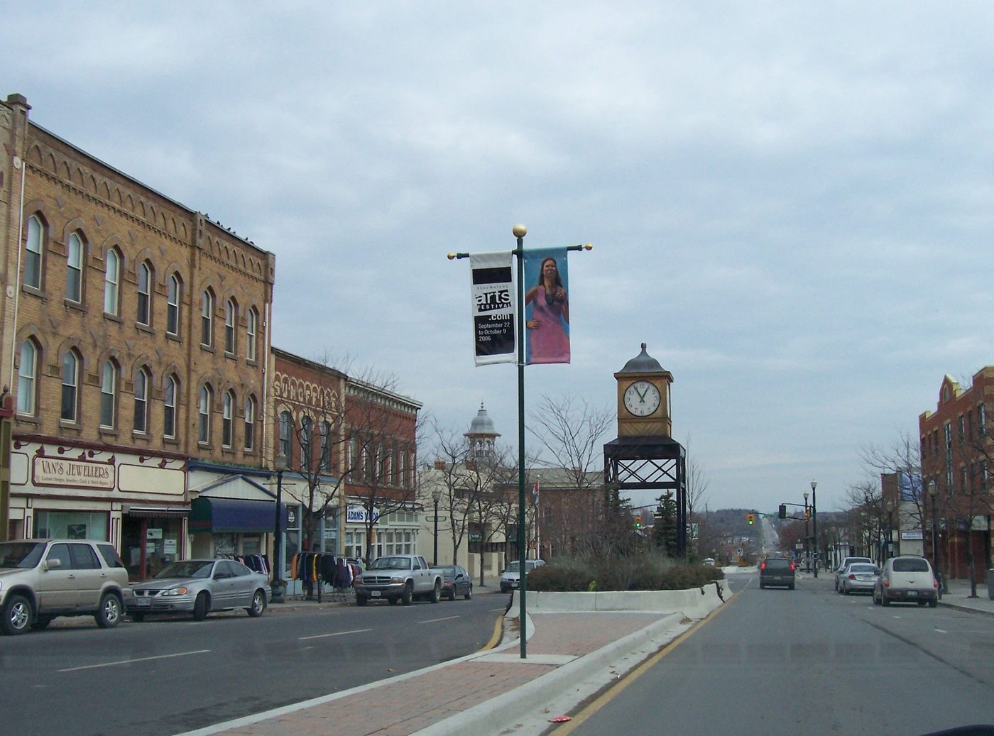 The town clock and Broadway storefronts in downtown Orangeville — Sensible serves commercial and industrial buildings across Orangeville, Ontario